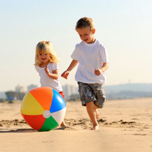 kids and beach ball