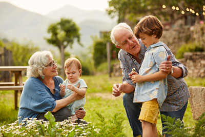 kids and grandparents gardening