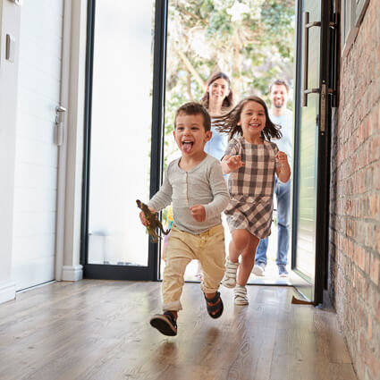 Smiling family of four