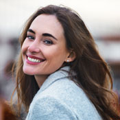 Dark haired woman with beautiful smile