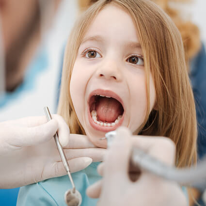 child at dentist