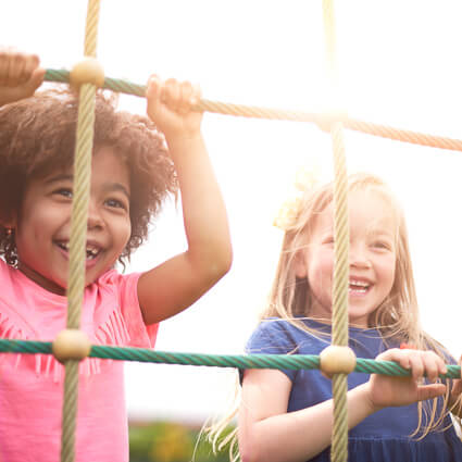kids playing on climbing ropes