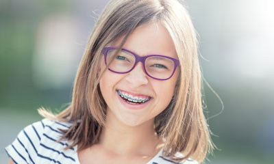 Girl smiling with braces