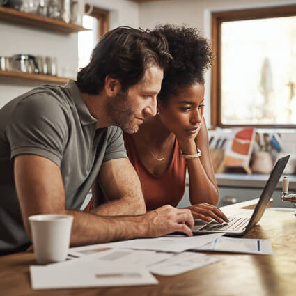 Couple looking at computer