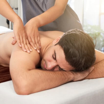 man getting a shoulder massage