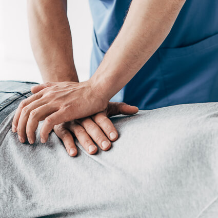 person having back adjusted