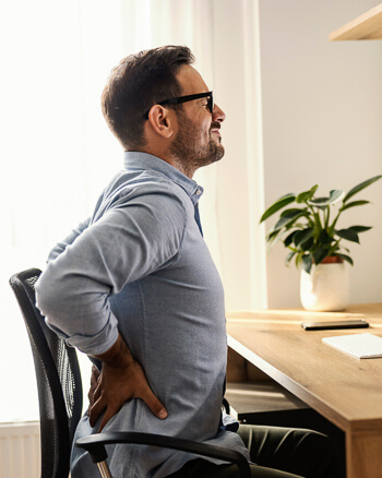man with strong back pain