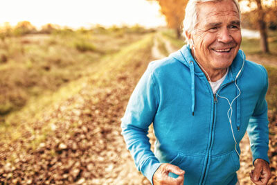 old man running on trail