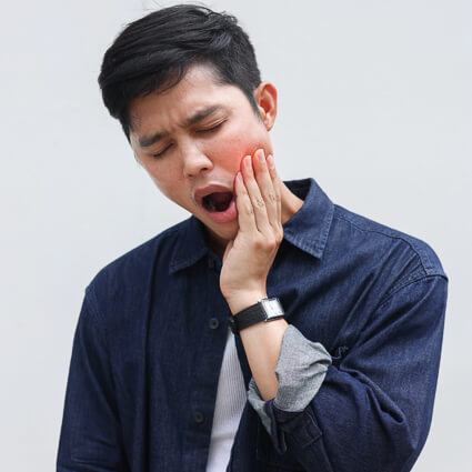 Man with facial pain
