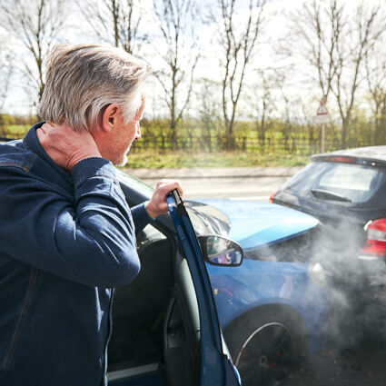 Man with neck pain after auto accident