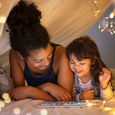 happy mom and kid playing