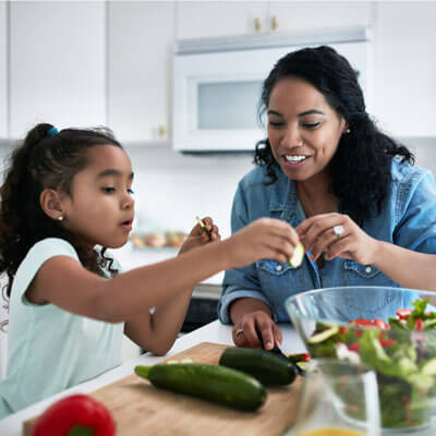 Family making healthy salad