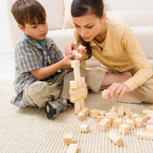 Woman and child playing