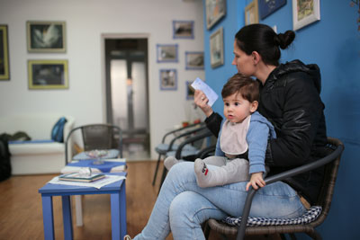 Woman and child in waiting room