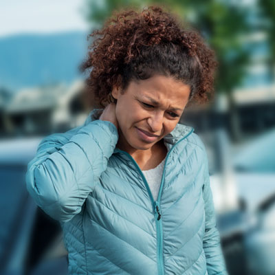 Woman with neck pain after accident