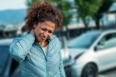 Female with neck pain after car crash