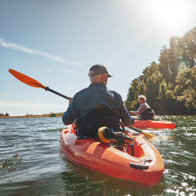 Elderly couple kayaking