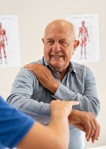 older man showing shoulder pain