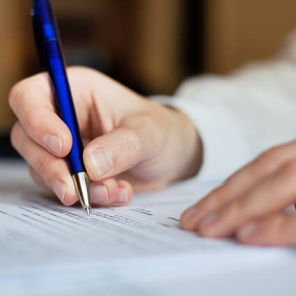 person filling out forms