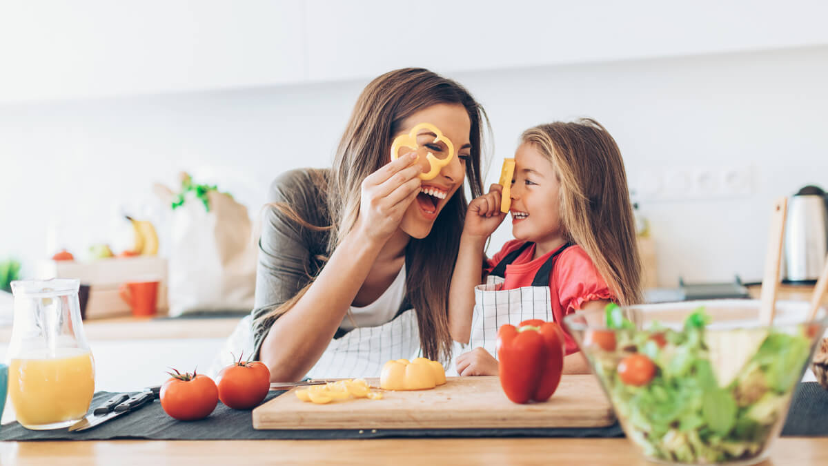 Mom and daughter cooking