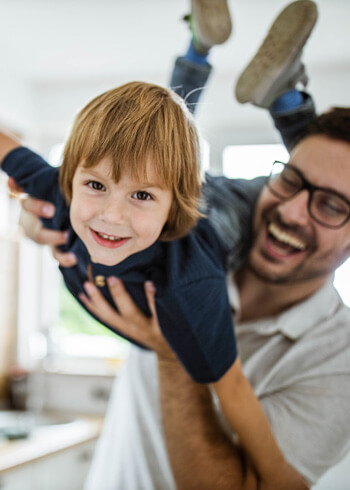 playing airplane with dad