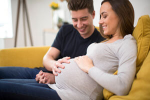 pregnant couple relaxing