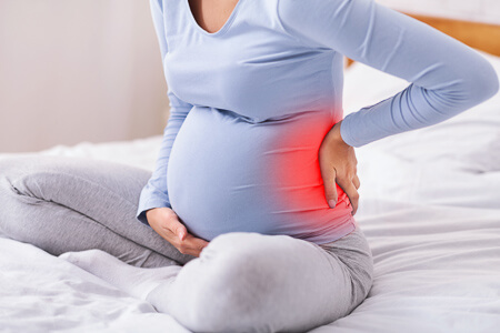 Pregnant woman with back pain