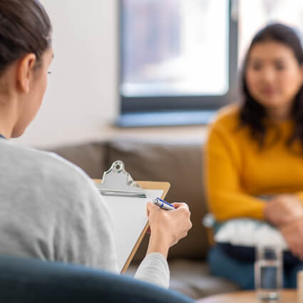 Consulting with patient