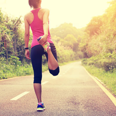 Woman stretching before run