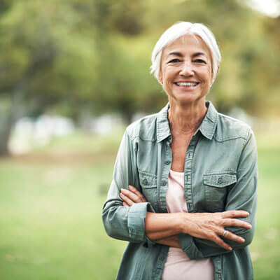 senior woman outdoors smiling