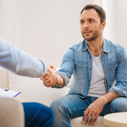 Shaking hands with patient