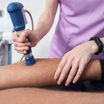 Using shockwave therapy on leg