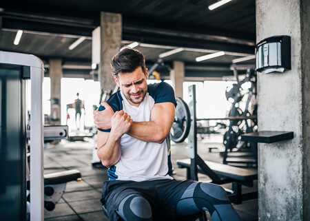 Male athlete with shoulder pain