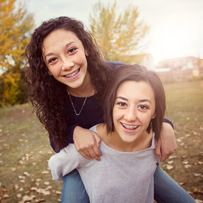 Two girls smiling