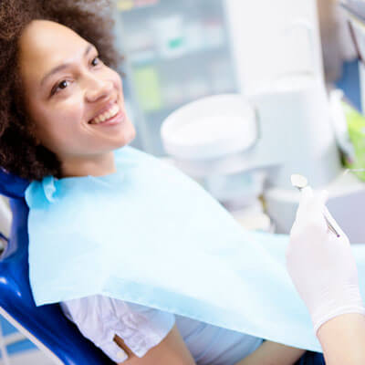 woman smiling in dental chair