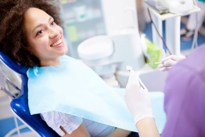 Patient listening to doctor at dental visit