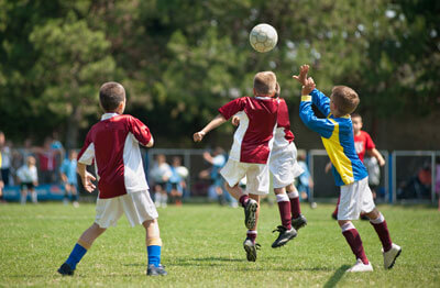 Kids playing soccer