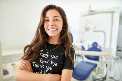 teenage girl in dental chair