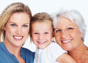 Three generations of women smiling