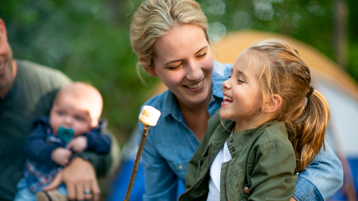 Girl and mom with marshmallow