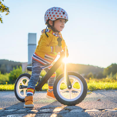 Happy child riding a bicycle