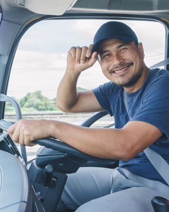 Truck driver tipping hat