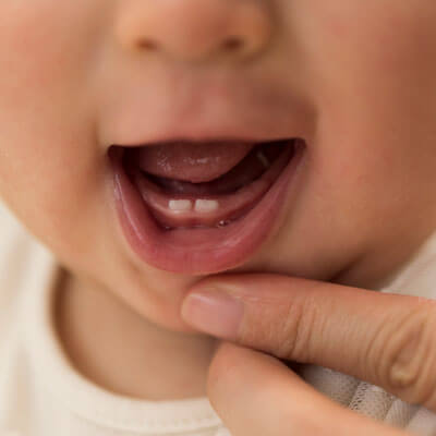 Showing baby teeth
