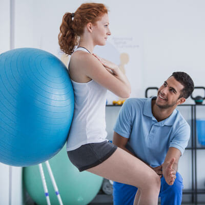 wall sit with therapy ball