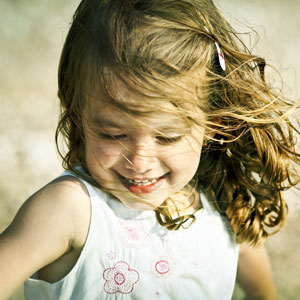 whimsical smiling girl