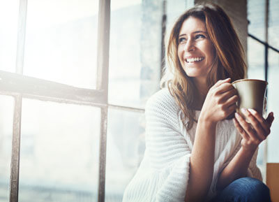 Woman looking out window