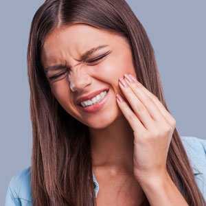 Young girl with jaw pain