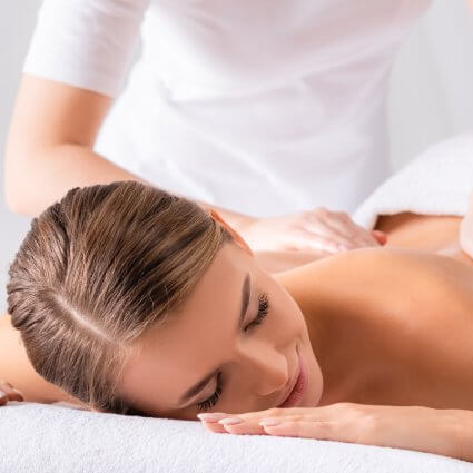 Woman having a relaxing back massage