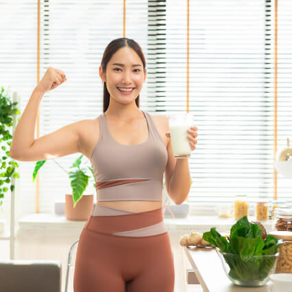 Woman showing her muscles