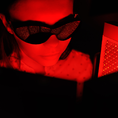Woman receiving red light therapy